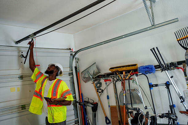 Professional Garage Door Panel Replacement technician working in Century, FL